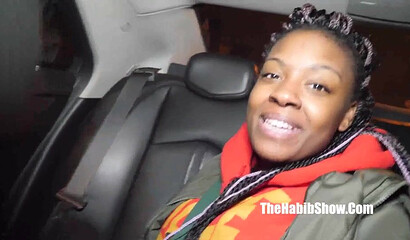 The black woman showed her tits and spread her legs in front of the man